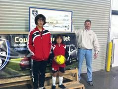 Merced Chevrolet in Merced CA community event photo of of kid with soccer ball